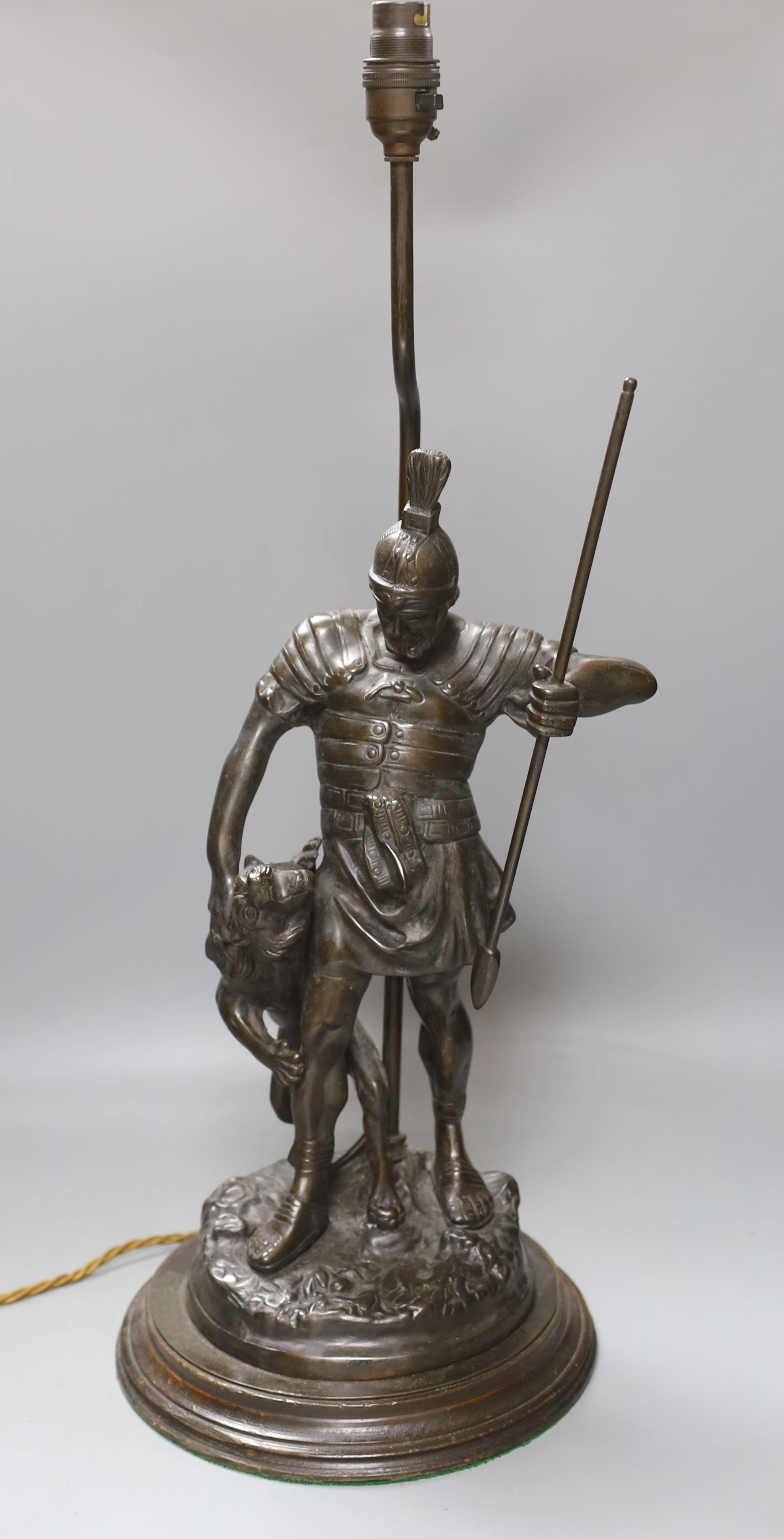 A bronze ‘gladiator’ lamp base. Total height 62cm